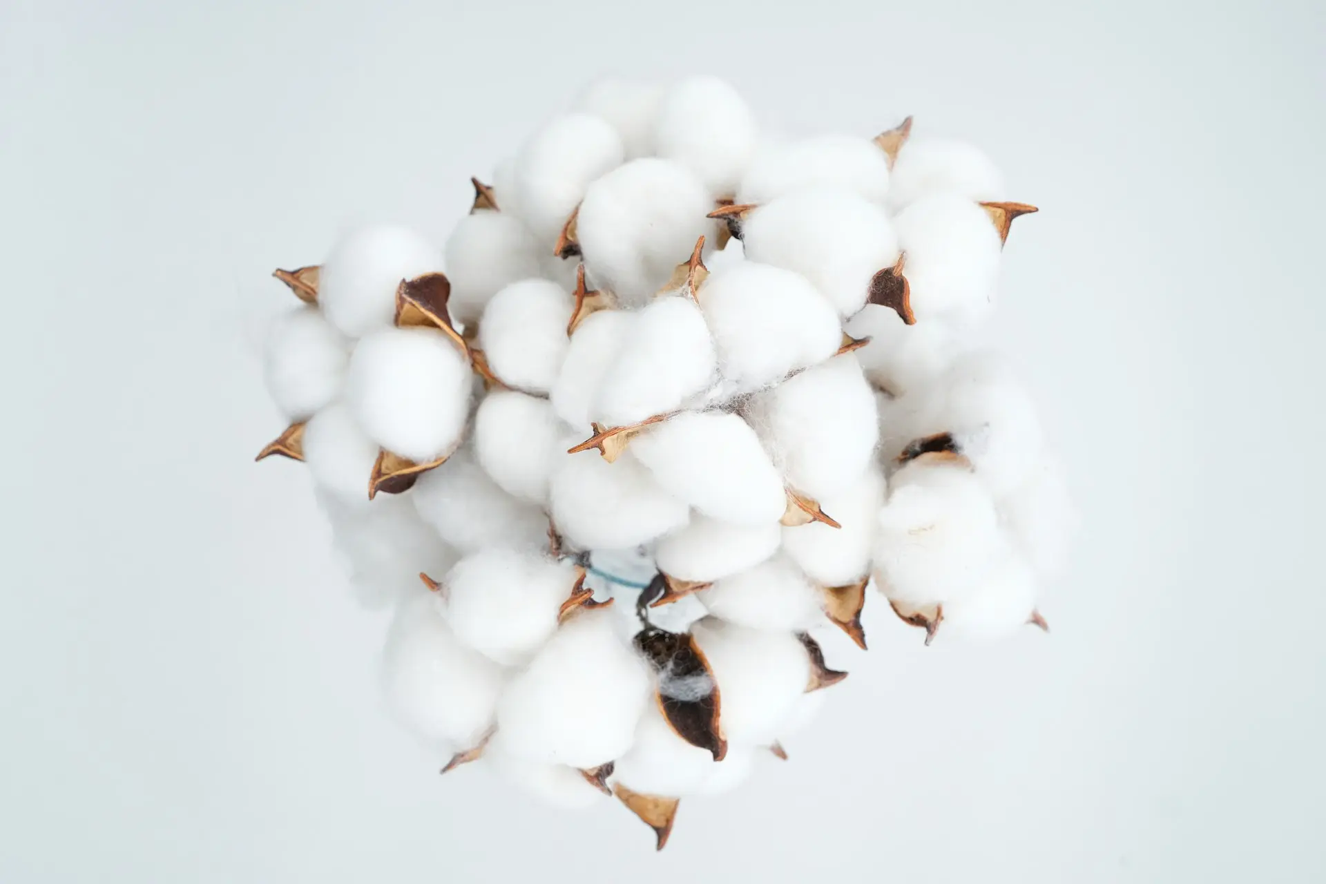 a bunch of cotton balls are piled on top of each other